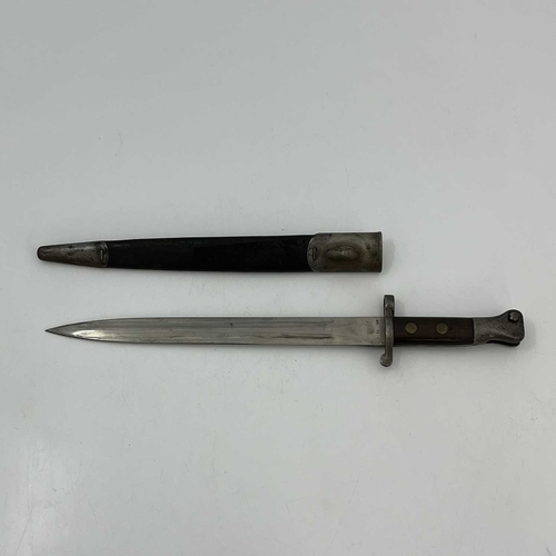 260 - Two British bayonets, a First World War British 1907 pattern SMLE bayonet by Wilkinson, two piece wo... 