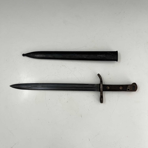 262 - Two bayonets, Finnish M1927 Mosin-Nagant sword bayonet by Fiskars, two piece wooden grip housed in s... 