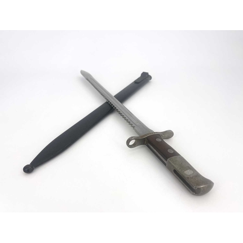 268 - A Swiss M1914 SchmidtRubin sawback bayonet by Hans Steimer, Wasen, single edged blade, rear sawback... 