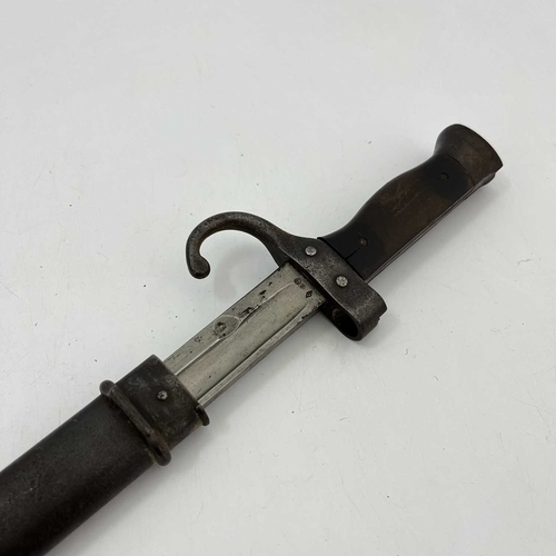 270 - A late 19th century French M1892 Mannlicher Berthier sword bayonet, two piece wooden grip and quillo... 