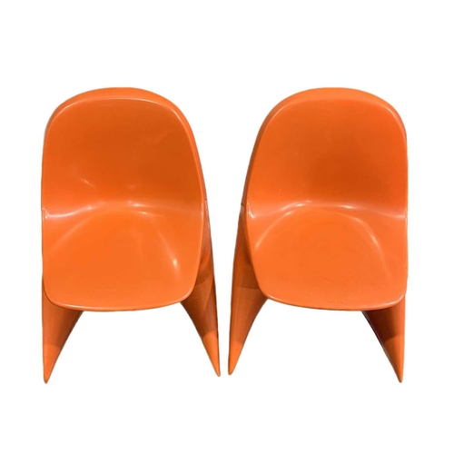 433 - Alexander Begge, a pair of Casalino I childrens chairs, moulded orange plastic (2)