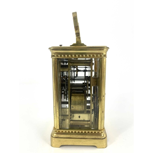 441 - A French repeating carriage clock, early 20th Century, gilt metal corniche case with swing handle, v... 