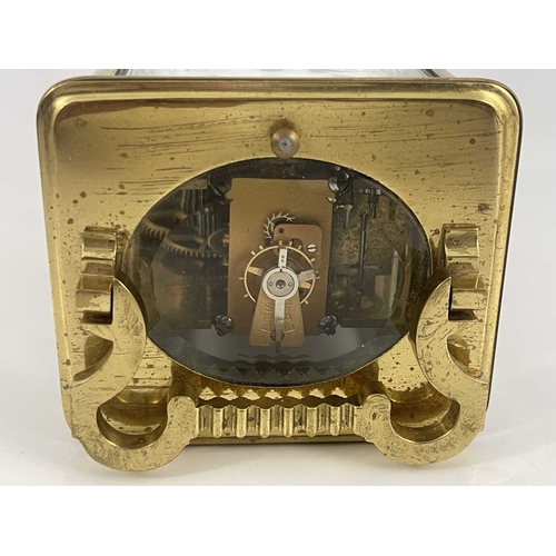 441 - A French repeating carriage clock, early 20th Century, gilt metal corniche case with swing handle, v... 