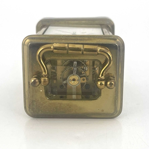 443 - A miniature carriage timepiece, early 20th Century, brass corniche case with visible escapement, whi... 