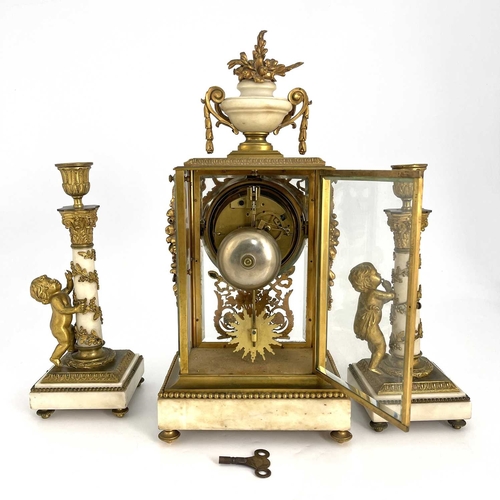 446 - Leroy, Paris, a late 19th Century French clock garniture, gilt metal four-glass case with white marb... 