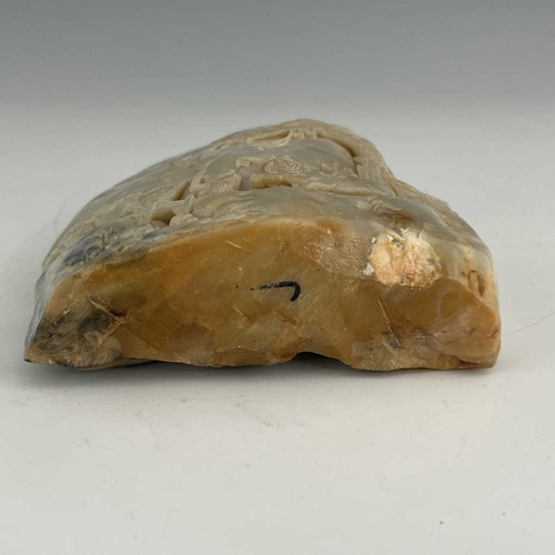 463 - A Chinese soapstone mountain boulder carving, the naturalistic rock carved in the round with an exte... 