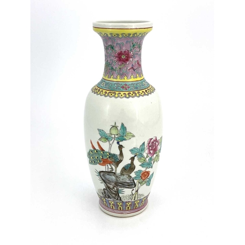 470 - A Chinese famille rose vase, shouldered form, decorated with peacocks and peonies on a rock, the rev... 