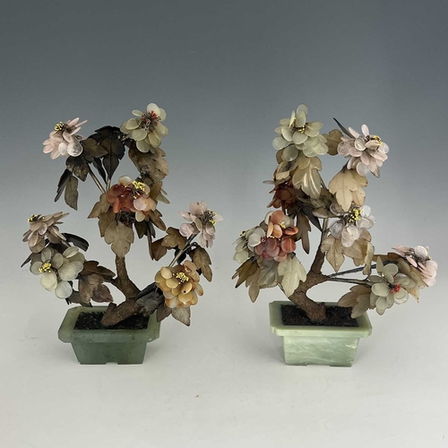 473 - A pair of Chinese hardstone trees, early 20th Century, the leaves in semi-precious translucent stone... 