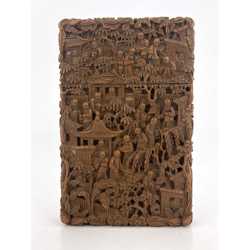 476 - A Chinese carved wood cardcase, modelled in relief with an extensive populated garden landscape of t... 