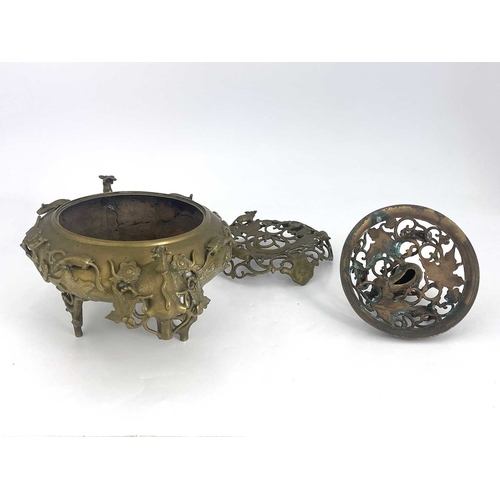 484 - A Chinese reticulated bronze incense burner, in three sections, with stand