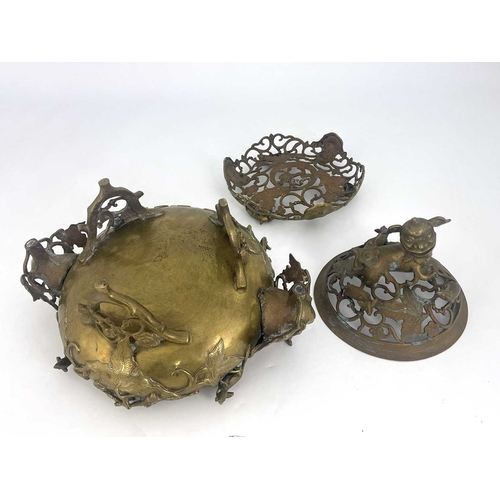 484 - A Chinese reticulated bronze incense burner, in three sections, with stand