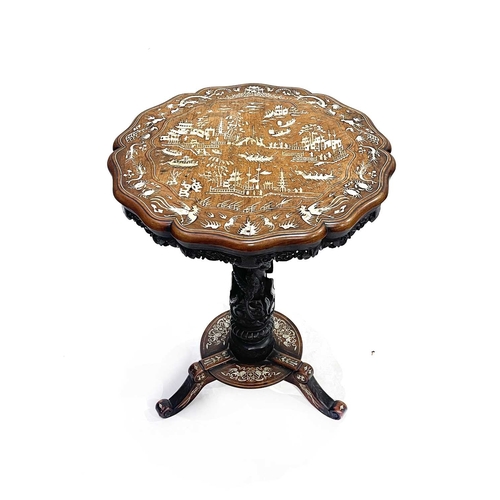 484A - A Chinese hardwood tripod occasional table, mid to late 19th Century, serpentine-edged circular top,... 