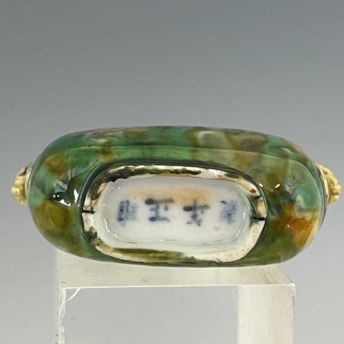 494 - A rare Chinese porcelain snuff bottle, 18th Century, decorated in mottled 'sancai' glazes of yellow ... 