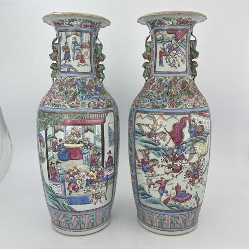 499 - A pair of Chinese porcelain vases, 19th Century, Guangxu period, 1875-1908, profusely decorated in m... 