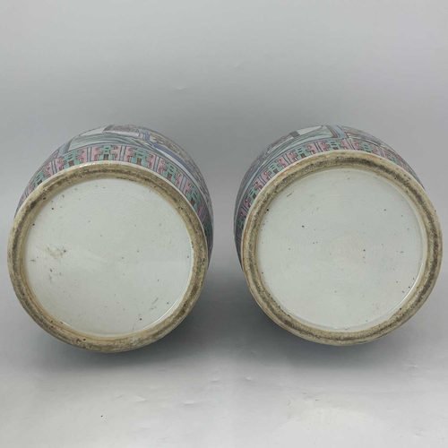 499 - A pair of Chinese porcelain vases, 19th Century, Guangxu period, 1875-1908, profusely decorated in m... 