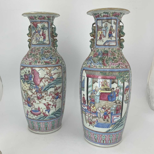 499 - A pair of Chinese porcelain vases, 19th Century, Guangxu period, 1875-1908, profusely decorated in m... 