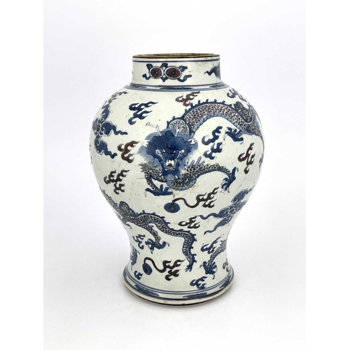 500 - A Chinese vase, Kangxi period, 1662-1722, of baluster form, boldly decorated in underglaze blue and ... 