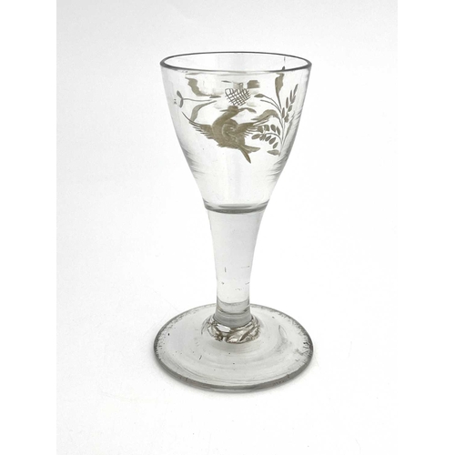 518 - A Jacobite type wine glass, circa 1765, the rounded bowl engraved with a bird in flight and a rose w... 