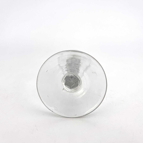 521 - A facet stem wine glass, circa 1780, the ogee bowl on a facet cut stem and conical foot, 13.5cm high... 