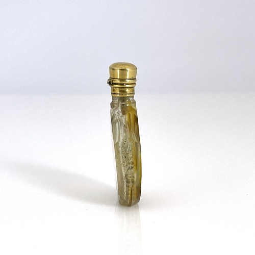 535 - A 19th century Bohemian amber flash cut glass scent bottle, shouldered shield form, engraved with a ... 