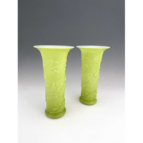 541 - Baccarat, a pair of French cased opaline glass vases, circa 1850s, flared trumpet form, relief mould... 