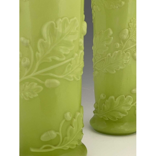 541 - Baccarat, a pair of French cased opaline glass vases, circa 1850s, flared trumpet form, relief mould... 