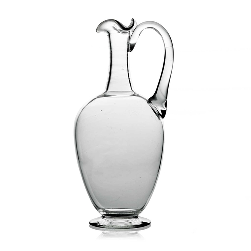 550 - James Powell and Sons, Whitefriars, an Arts and Crafts small glass claret jug, footed ovoid form wit... 