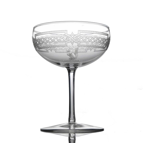 553 - Thomas Webb, an Edwardian crest engraved and etched Champagne glass, circa 1905, the hemispherical b... 