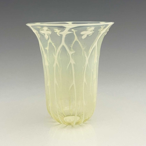 562 - John Walsh Walsh, an Arts and Crafts opalescent glass light shade, bell form, optic moulded with tho... 