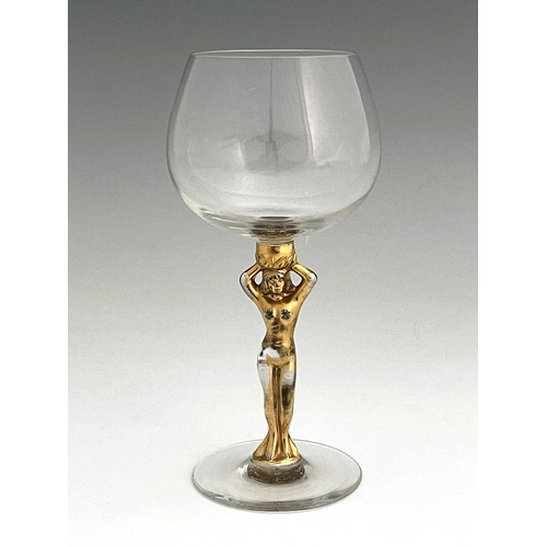 598 - Bayel, a French gilt glass figural Bacchante wine glass, the stem modelled as a nude with arms raise... 