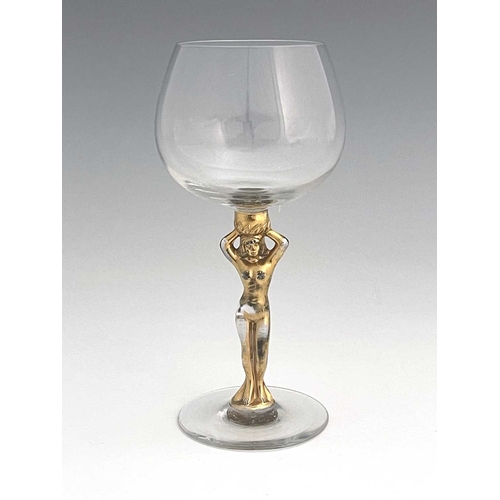 598 - Bayel, a French gilt glass figural Bacchante wine glass, the stem modelled as a nude with arms raise... 