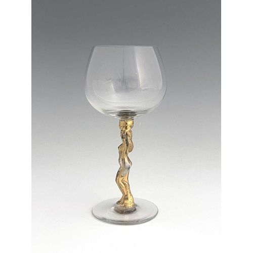 598 - Bayel, a French gilt glass figural Bacchante wine glass, the stem modelled as a nude with arms raise... 