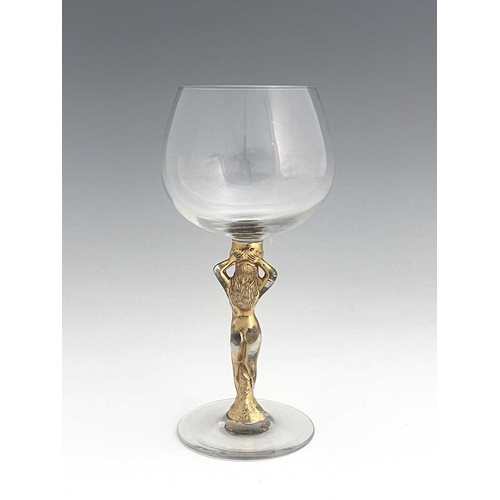 598 - Bayel, a French gilt glass figural Bacchante wine glass, the stem modelled as a nude with arms raise... 