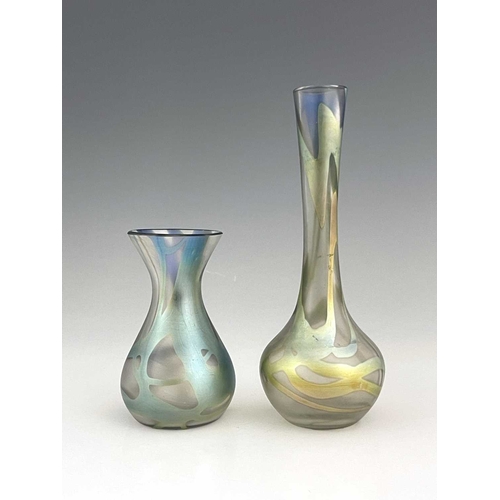 636 - Okra, two iridescent studio glass vases, baluster and bulbous forms, with veined lustre webbing over... 