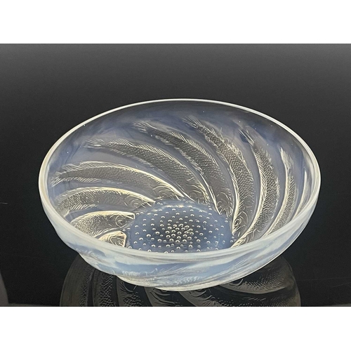 648 - Rene Lalique, a Poissons opalescent glass bowl, model 3211, designed circa 1921, polished, relief mo... 