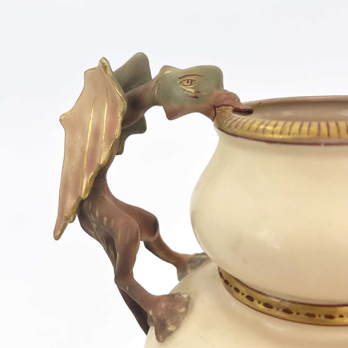 673 - Alfred Stellmacher, an Amphora figural twin handled vase, circa 1885, blush ivory ground double gour... 