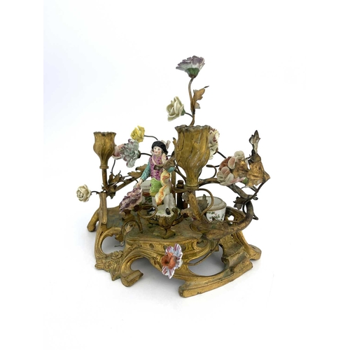 682 - A German porcelain and ormolu mounted florally encrusted figural desk stand, in the Meissen style, t... 