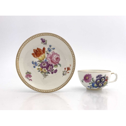 683 - A Meissen Marcolini period tea cup and saucer, circa 1780, painted with floral sprays and flower vig... 