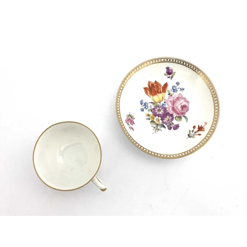 683 - A Meissen Marcolini period tea cup and saucer, circa 1780, painted with floral sprays and flower vig... 