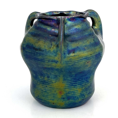 703 - Heliosine, an Austrian Secessionist iridescent pottery vase, circa 1900, three handled hexagonal sec... 