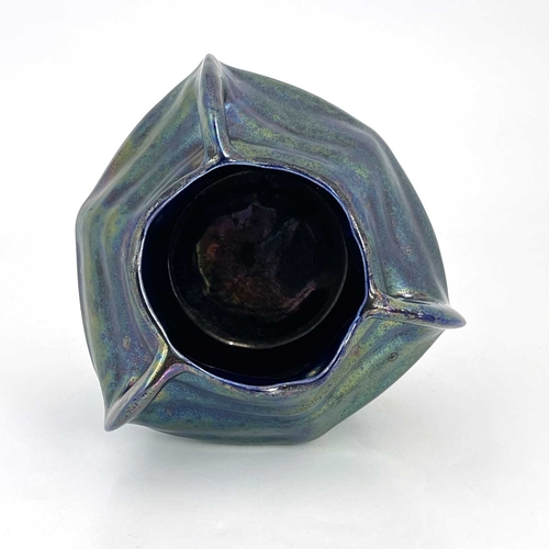 703 - Heliosine, an Austrian Secessionist iridescent pottery vase, circa 1900, three handled hexagonal sec... 