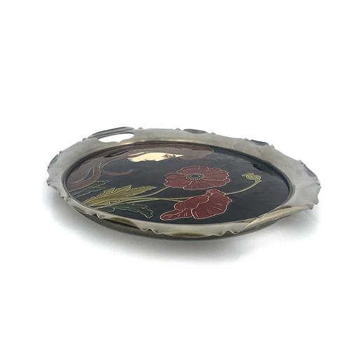 705 - Carl Luber for Johann von Schwarz, an Art Nouveau dust pressed oval tray, decorated with a maiden an... 