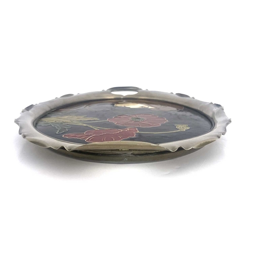 705 - Carl Luber for Johann von Schwarz, an Art Nouveau dust pressed oval tray, decorated with a maiden an... 