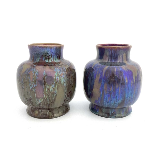 706 - A pair of Dutch iridescent art pottery vases, St Lukas, Utrecht, shouldered ovoid form, marbled lust... 