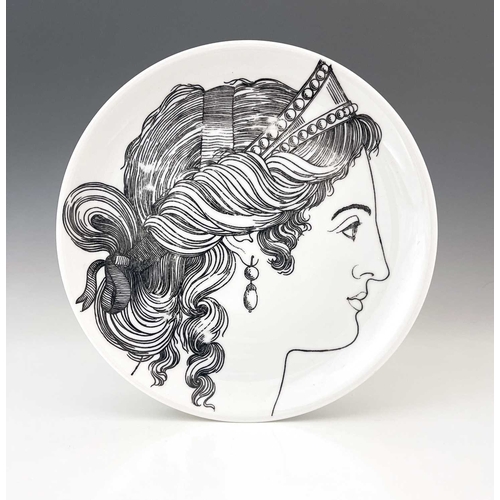 710 - Pierro Fornasetti for Eschenbach, a pair of Le Bellezze plates, circa 1950s, decorated in black with... 