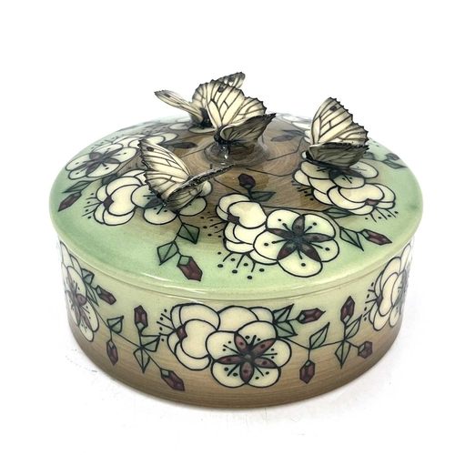 713 - Sally Tufin for Dennis China Works, a limited edition butterfly and rose circular box and cover, 200... 