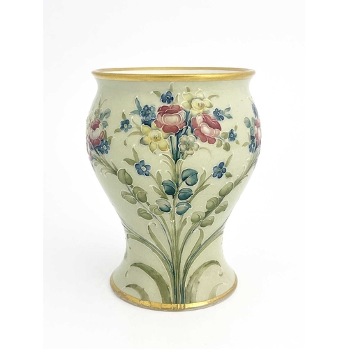 714 - William Moorcroft for James MacIntyre, a Rose, Tulip and Forget me Not vase, circa 1908, inverse bal... 