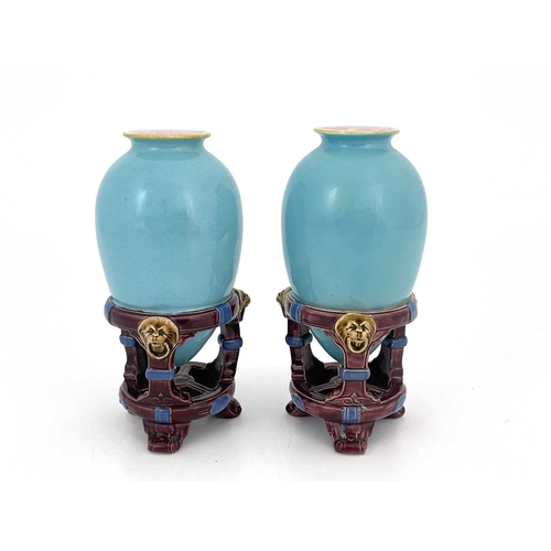 719 - Christopher Dresser for Minton, a pair of Aesthetic Movement majolica vases, 1862, amphora form in i... 