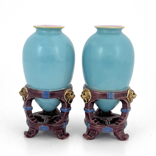 719 - Christopher Dresser for Minton, a pair of Aesthetic Movement majolica vases, 1862, amphora form in i... 