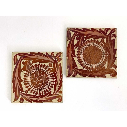 736 - William De Morgan, a pair of red lustre Sunflower tiles, circa 1878, painted on Craven Dunnil and Co... 